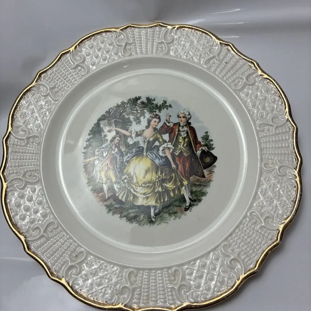 This Vogue Dinnerware Washington Colonial pattern plate with a courting couple